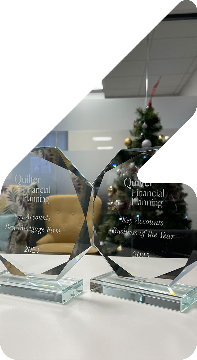 Photo of 2 glass awards on a table